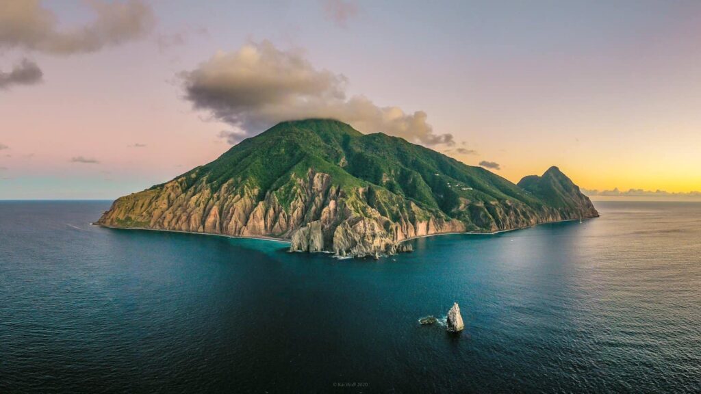 saba island rising from the caribbean sea