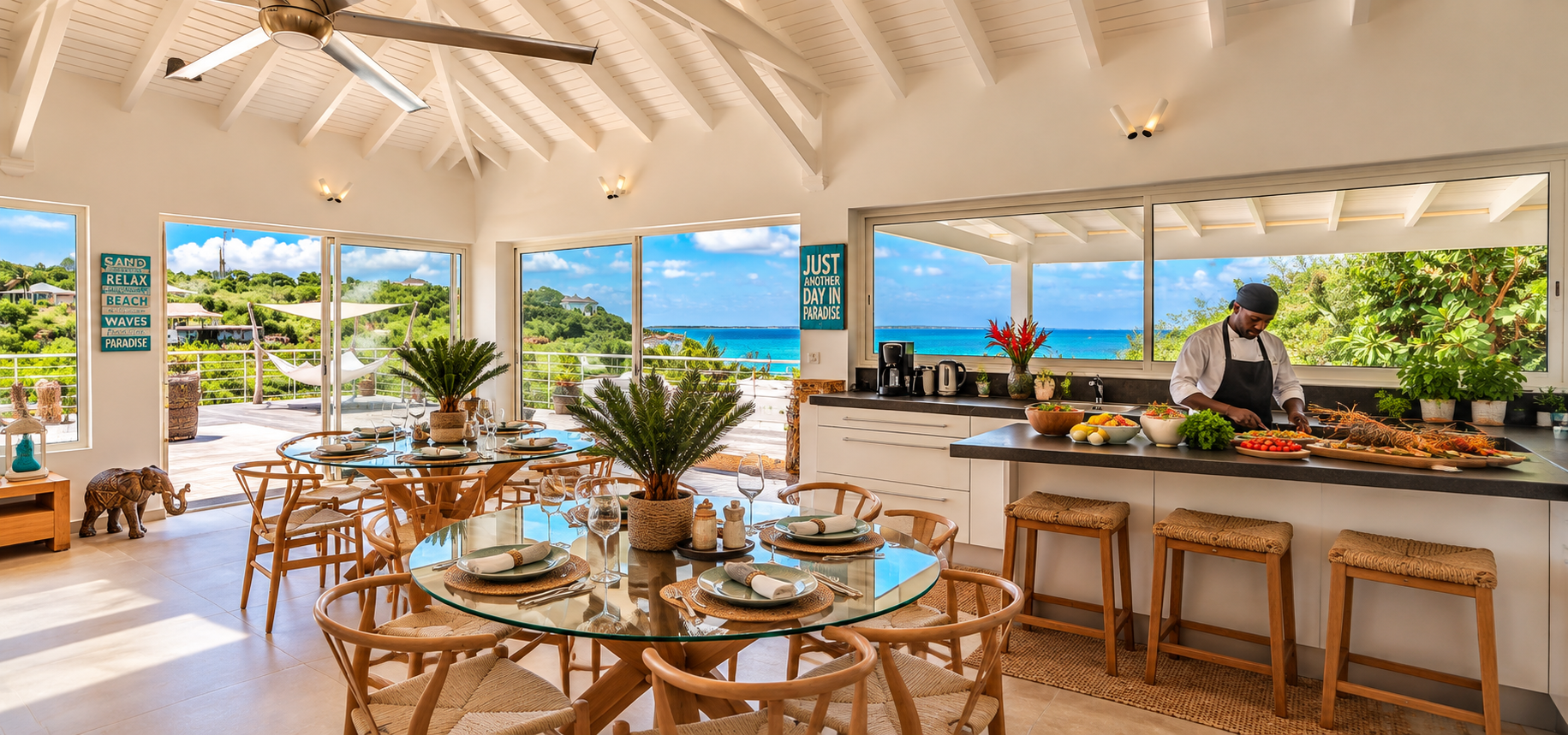Private chef preparing a meal in a St. Martin villa kitchen overlooking the Caribbean Sea